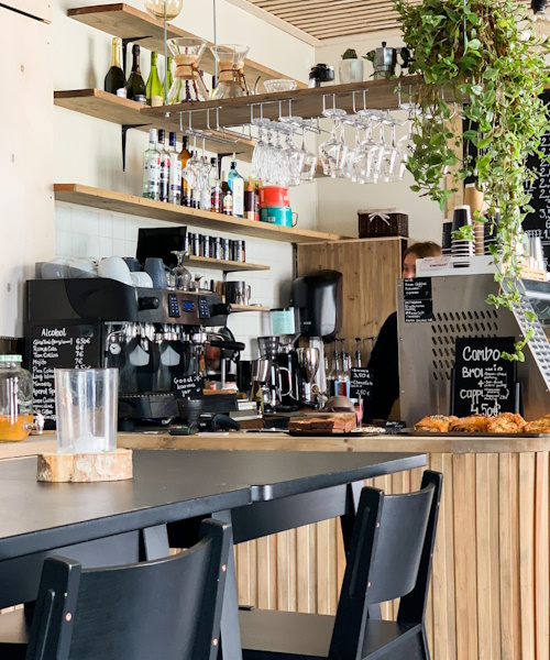 A photo of a restaurant where people can have food or coffee